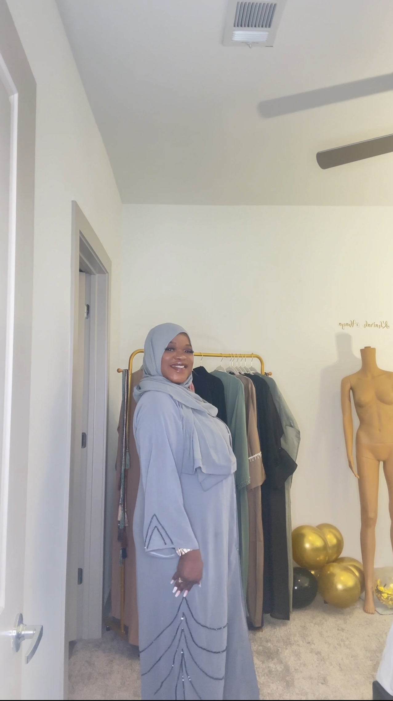 Long flowing soft blue Abaya With Rhinestone at the sleeve and bottom